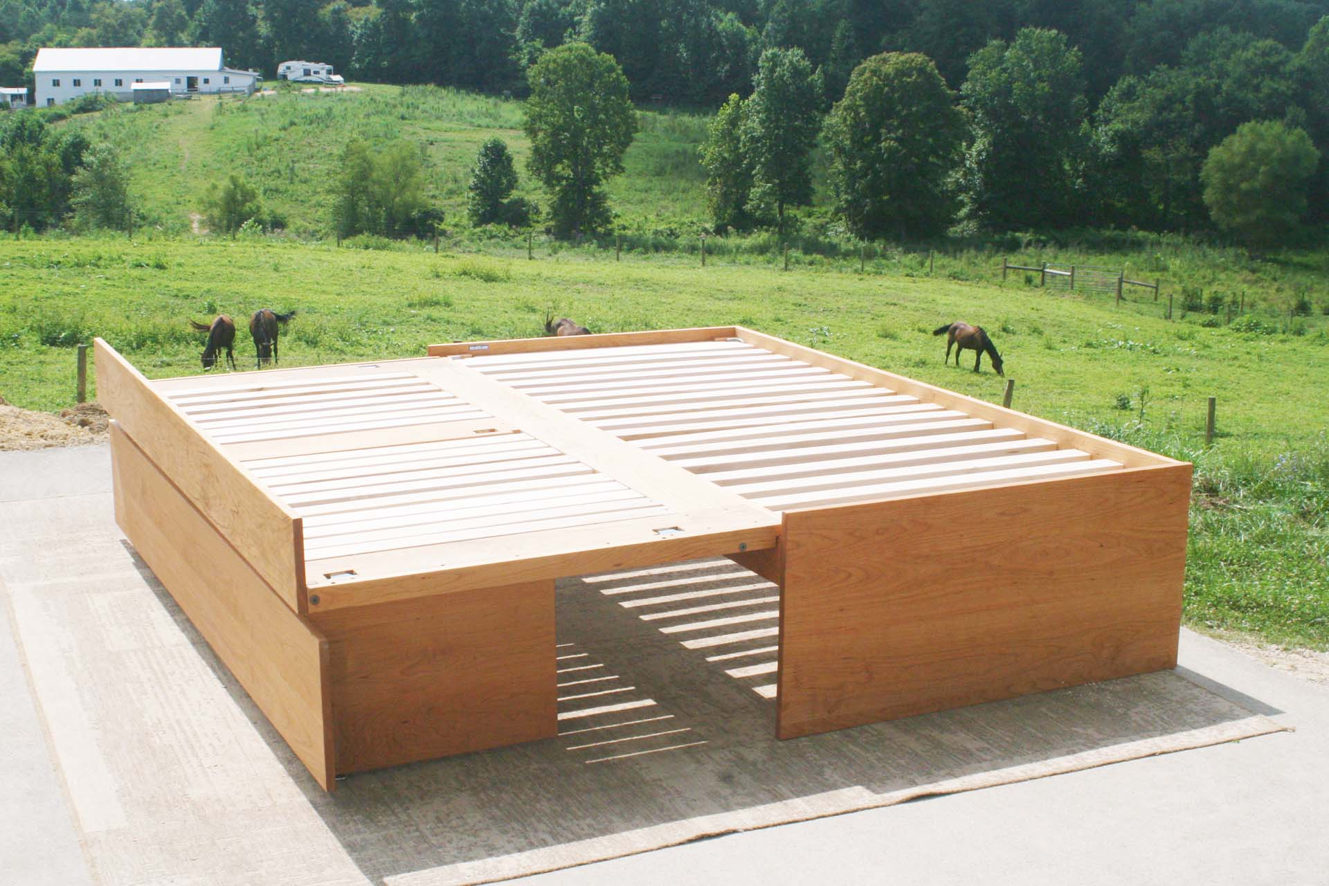 angled view Trundle Bed with Pull Lift Handle and No Headboard with trundle out