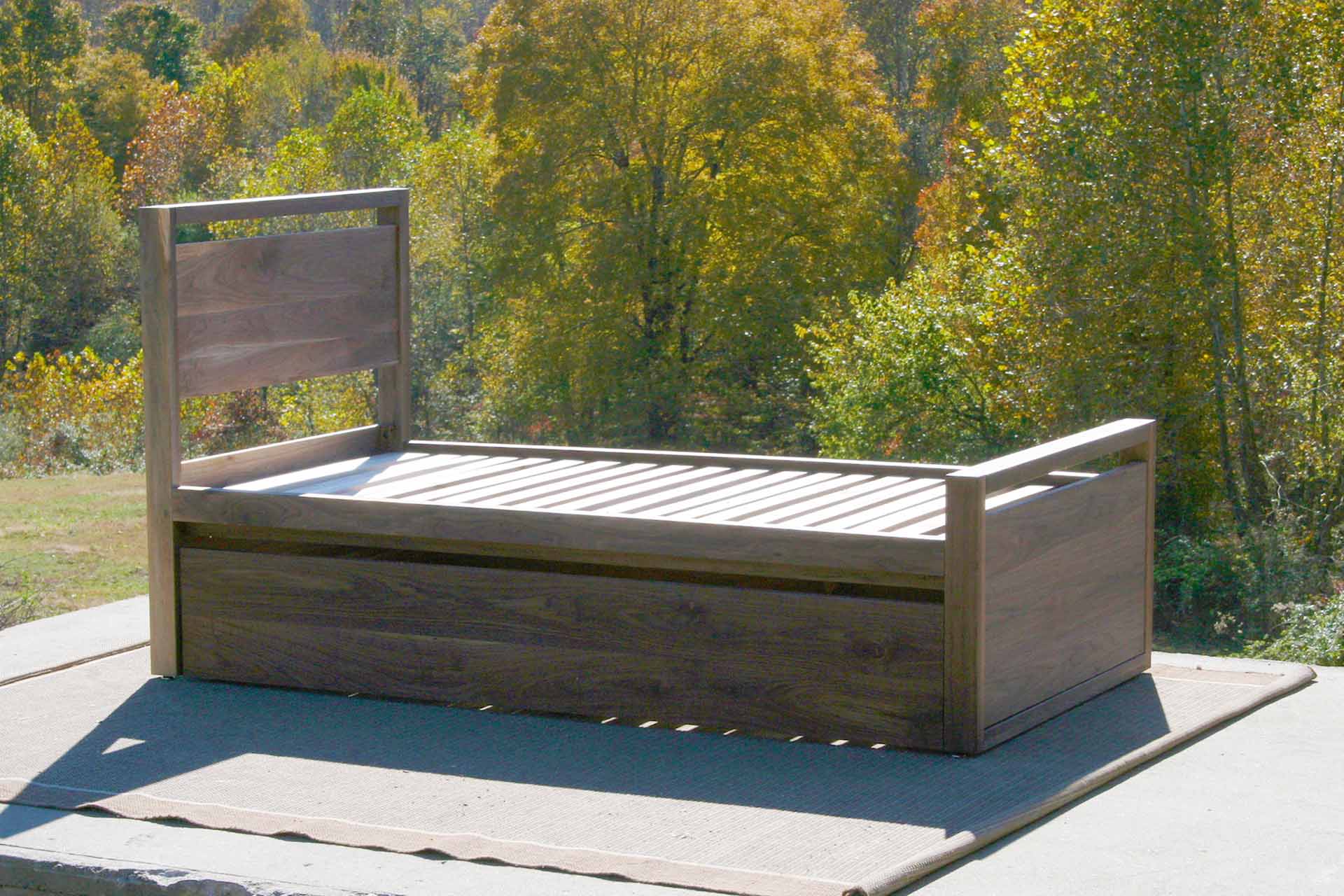 side view Trundle Bed with top rails on headboard and footboard