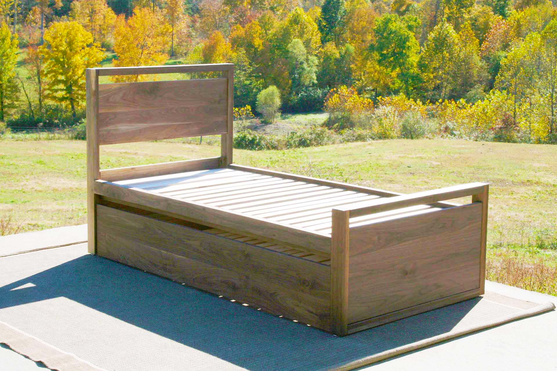 hardwood Trundle Bed with top rails on headboard and footboard