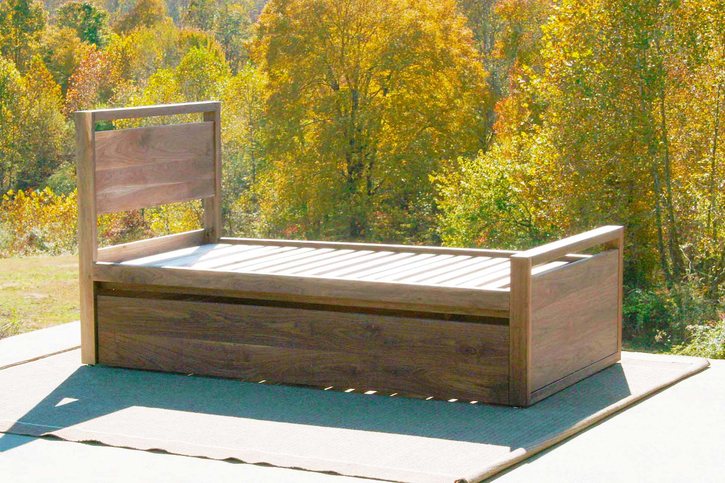 side view Trundle Bed with top rails on headboard and footboard