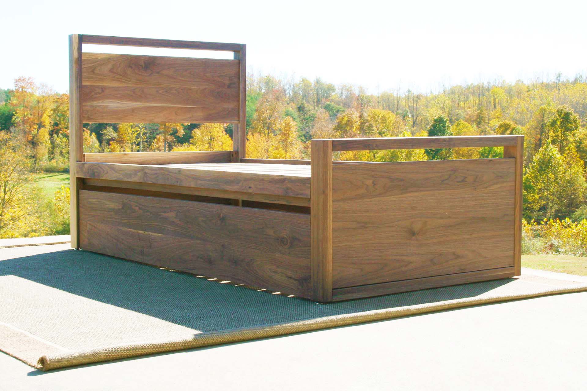 low angled view Trundle Bed with top rails on headboard and footboard