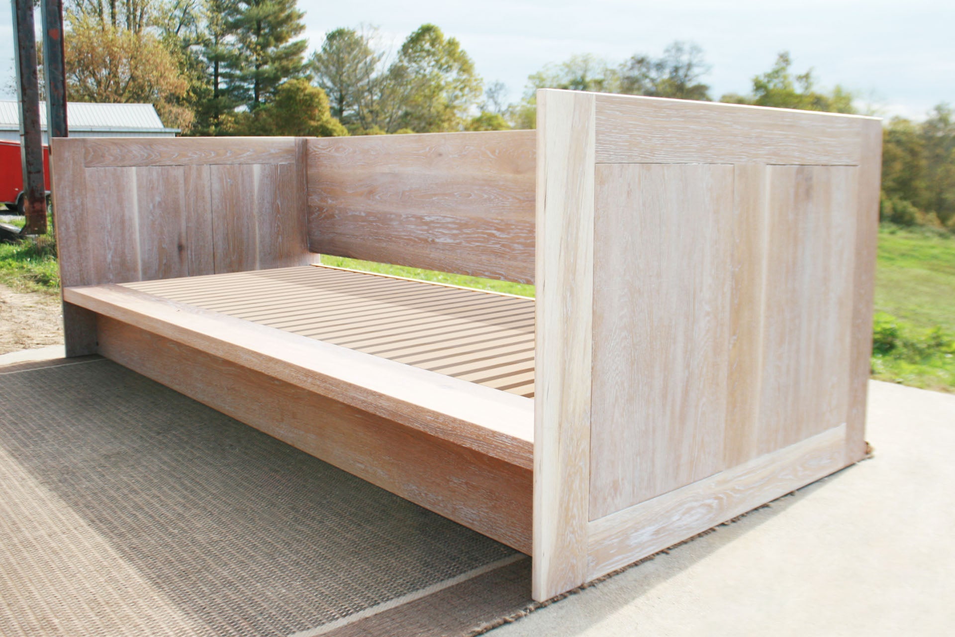 close angled view Day Bed with a solid back and sides