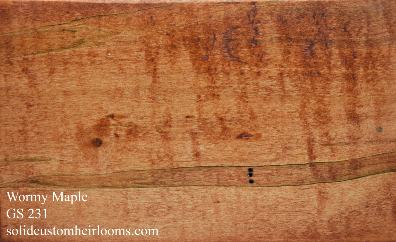 wormy maple with a honey-brown finish