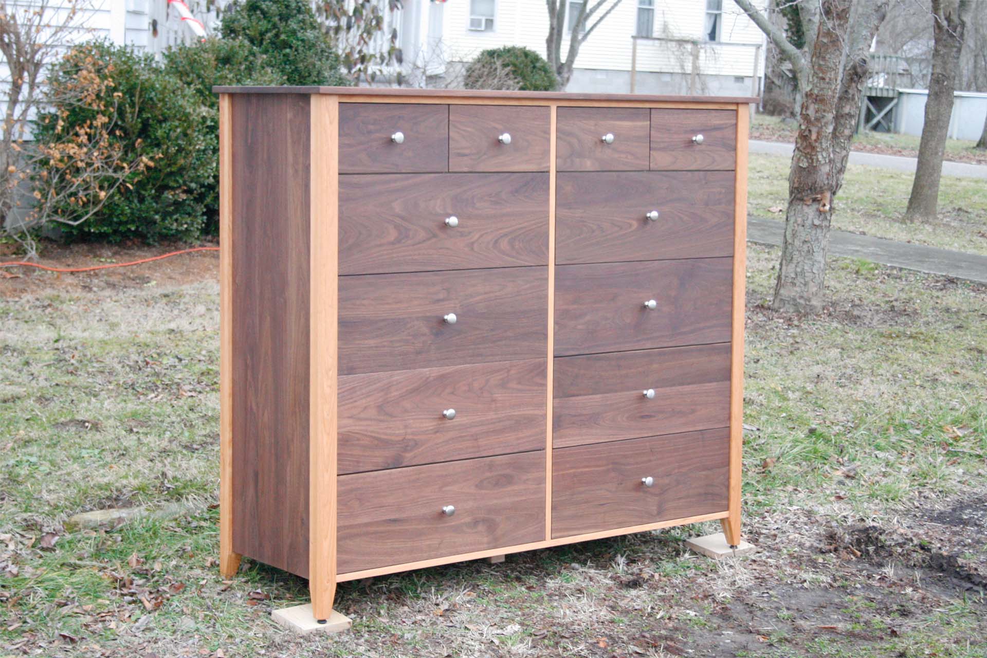 front angled view 12 drawer dresser hardwood trim