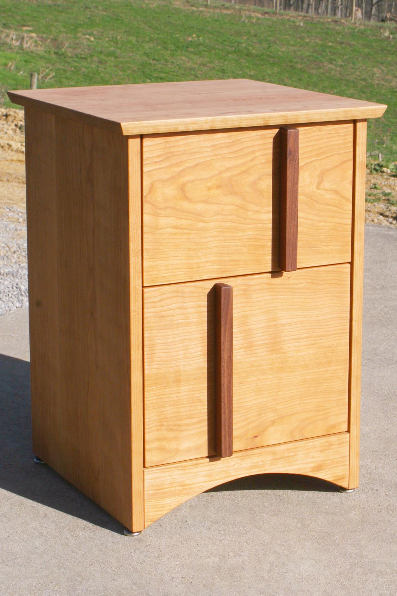 solid angled view natural Multi Drawered Nightstand with Offset Pulls