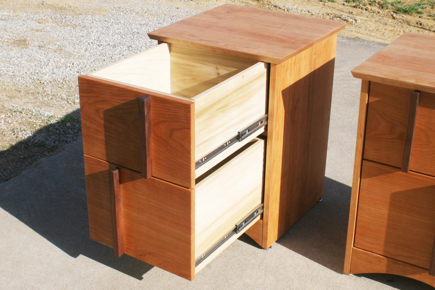 drawers open angled view Multi Drawered Nightstand with Offset Pulls