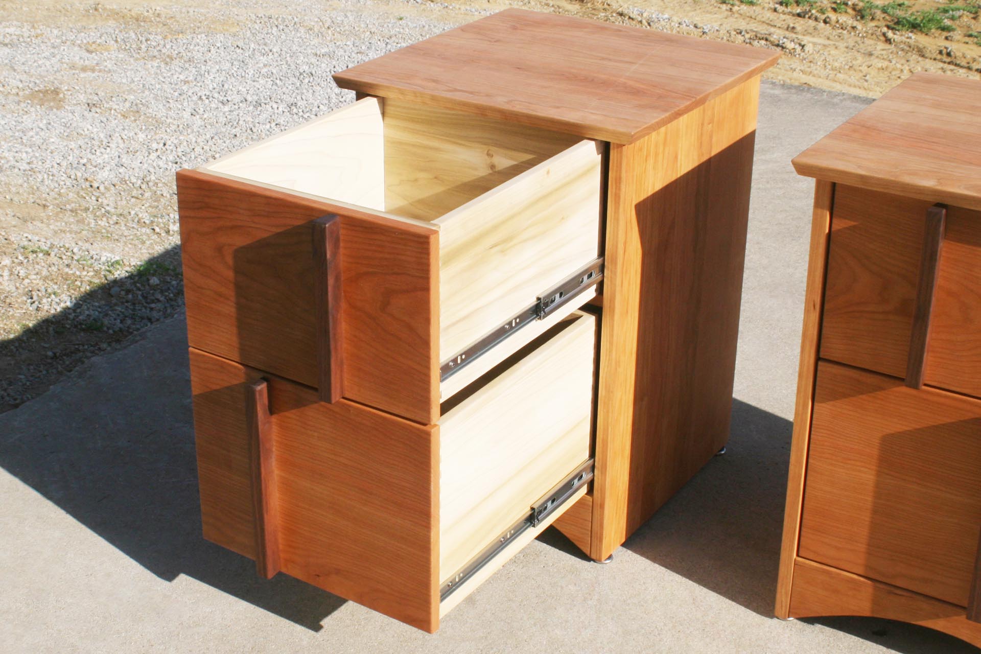 drawers open angled view Multi Drawered Nightstand with Offset Pulls