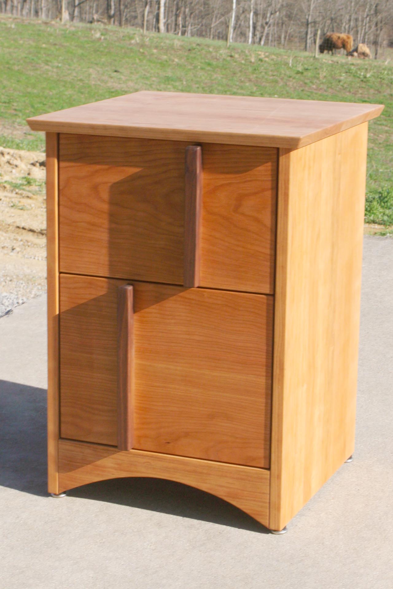 Multi Drawered Nightstand with Offset Pulls angled view natural