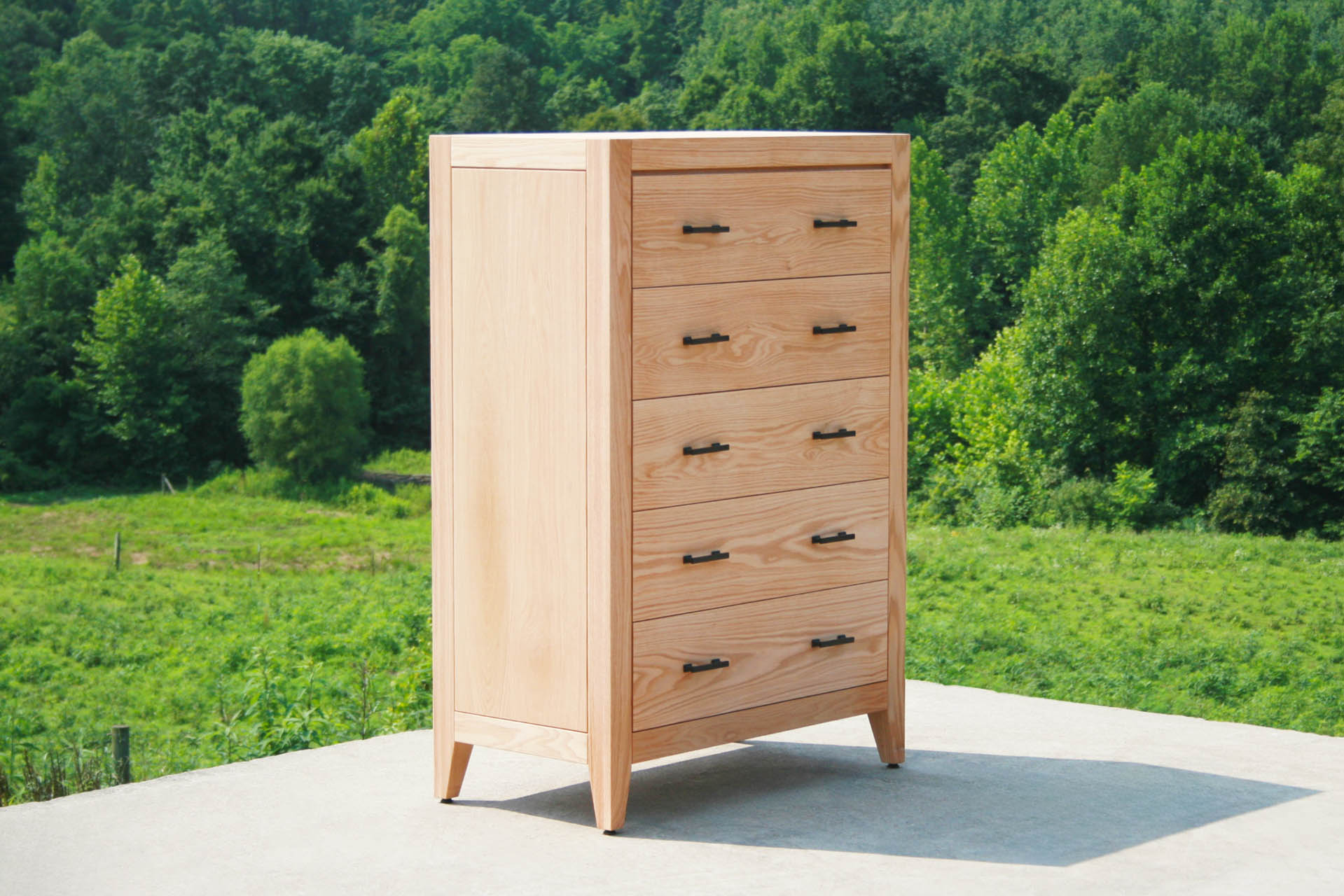 angled view tall dresser