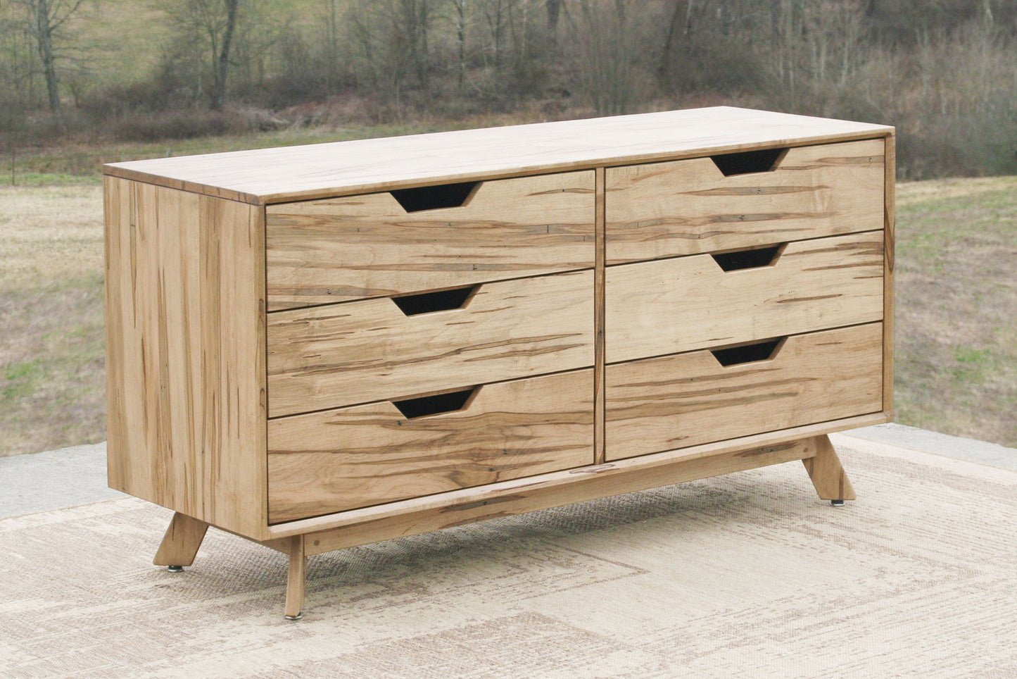 side angled view Modern dresser with angled legs