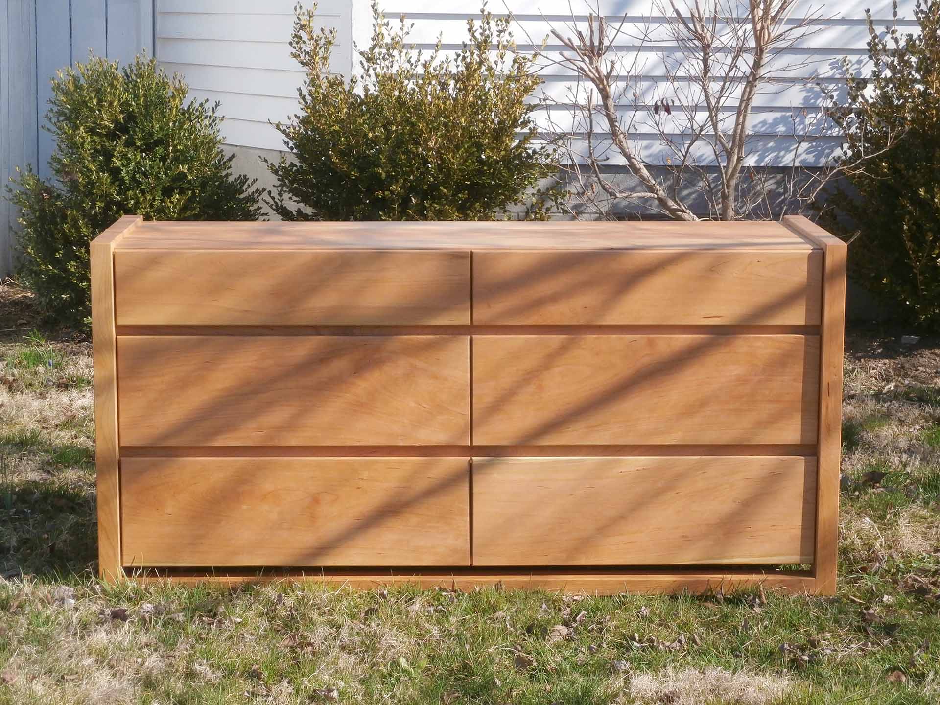 6 drawer dresser with framed ends and overlap drawers 
