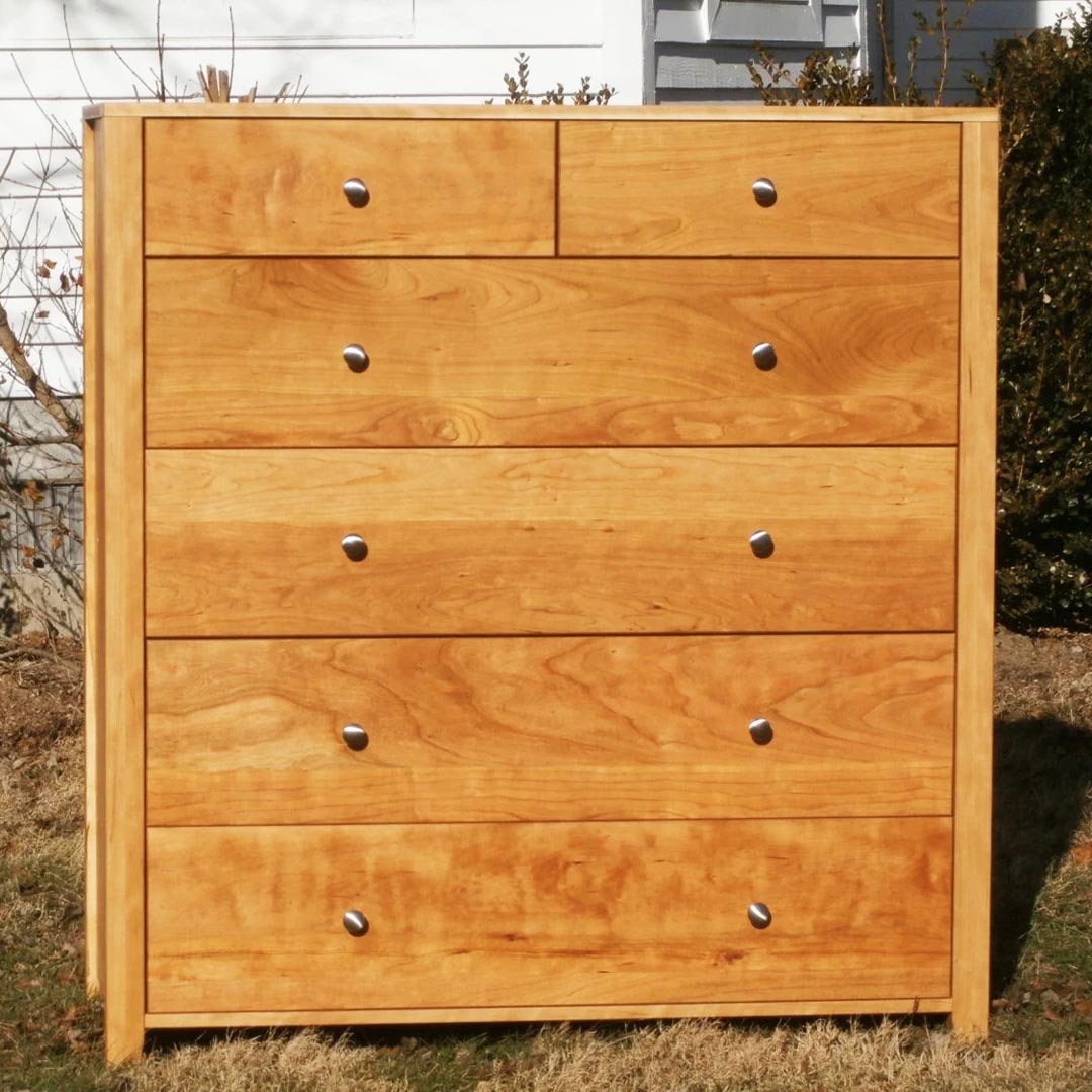 hardwood dresser with 6 drawers and round handles front view