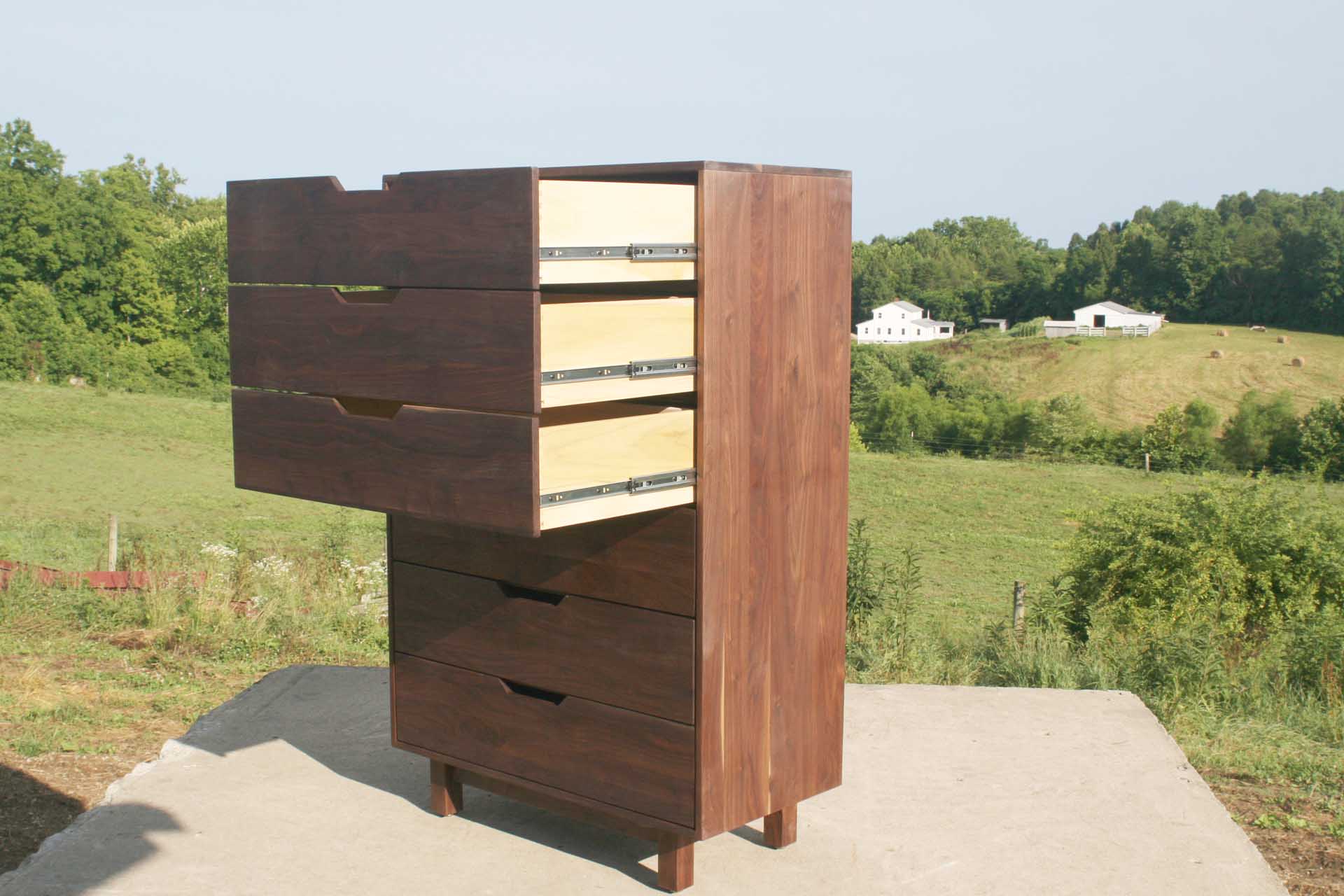 tall dresser with 6 deep drawers top drawers open angled view