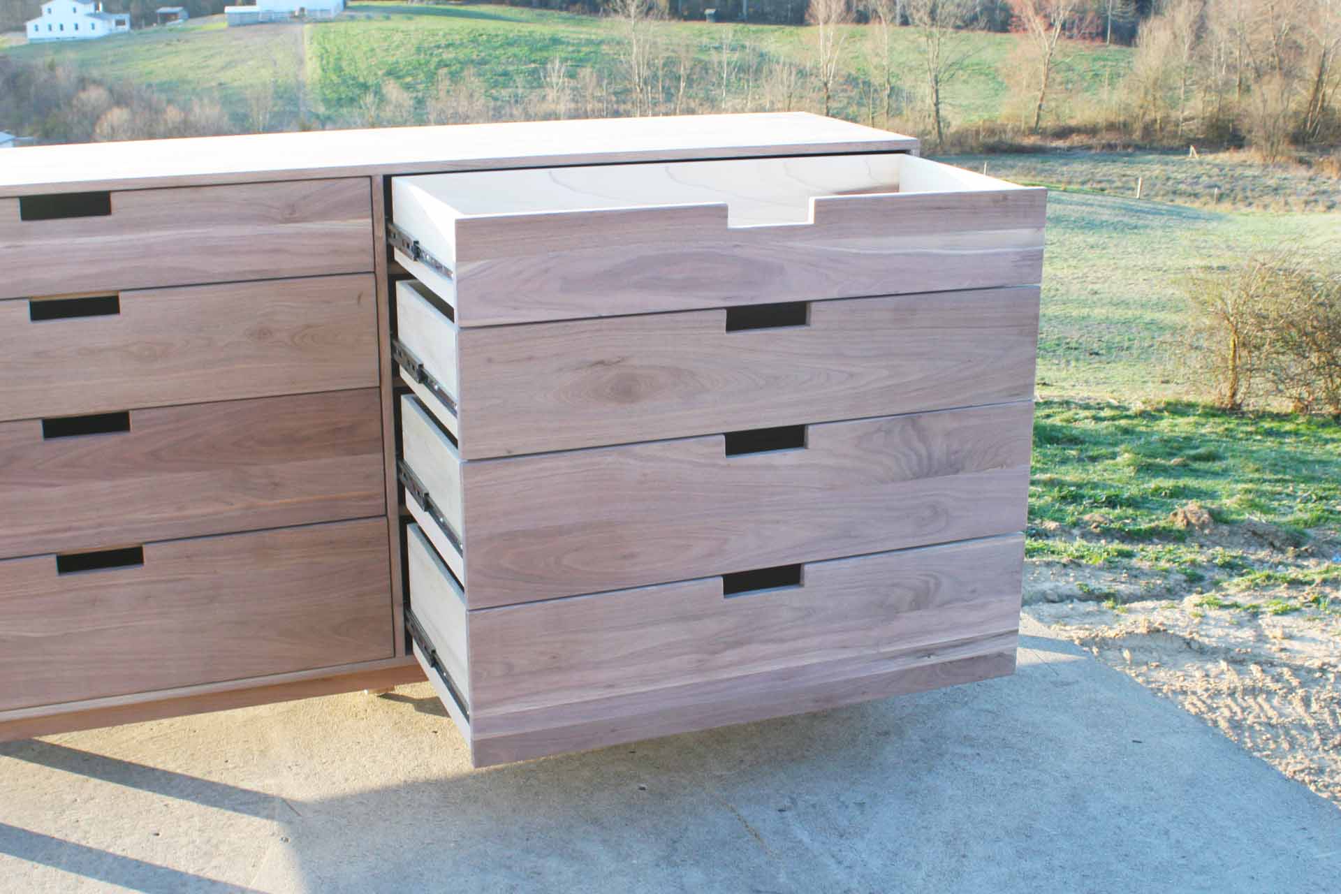 close up Dresser with 8 inset drawers and cut out pulls drawers out