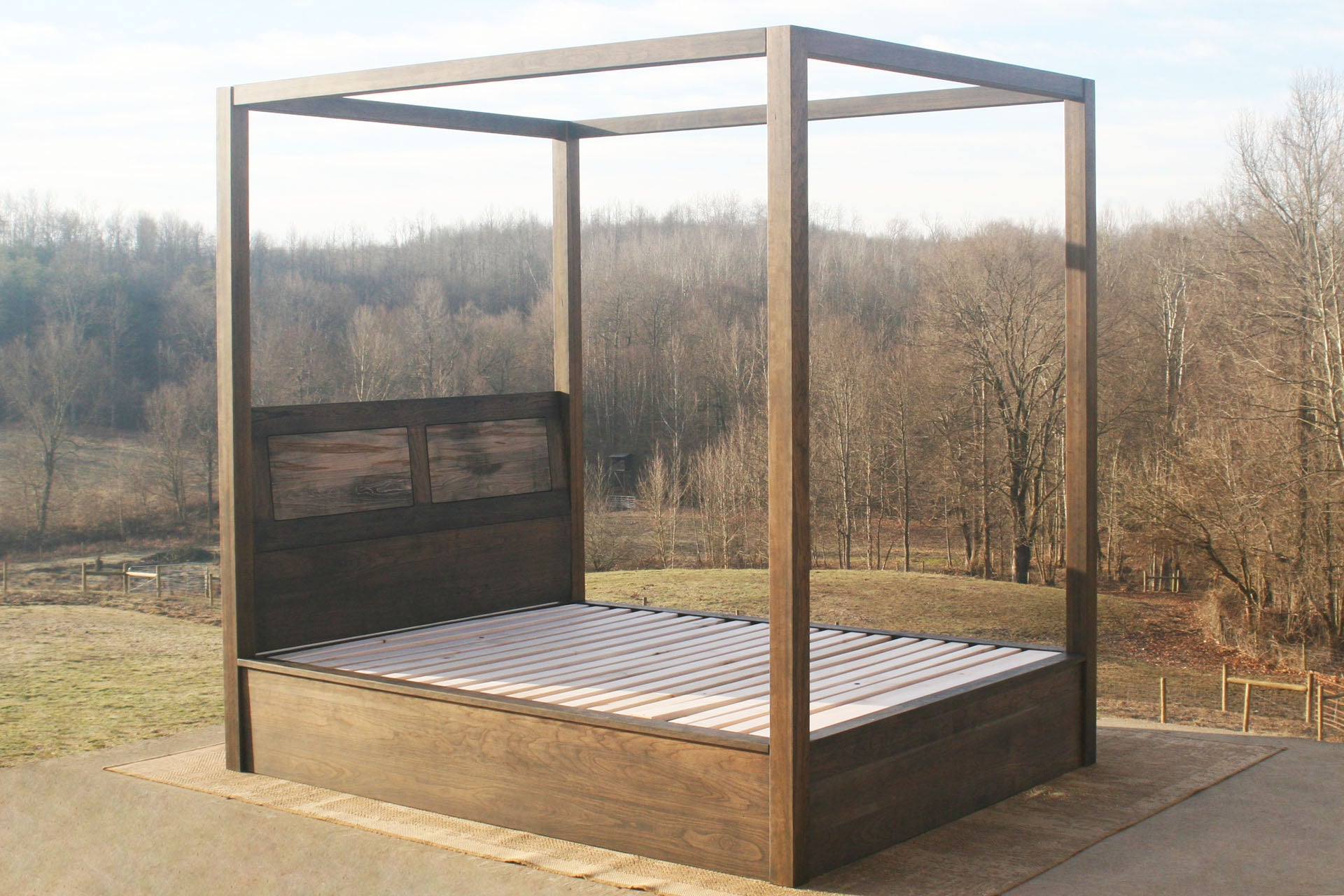 solid Canopy Bed with angled headboard and large rails side angled view