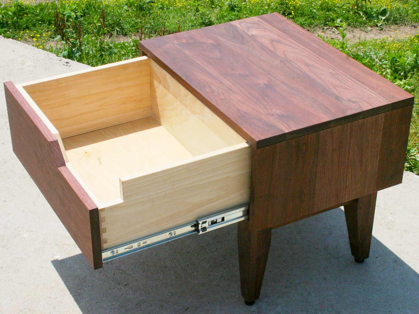 small nightstand with drawer open