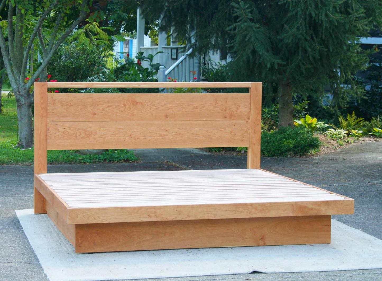 Platform bed with 4 drawers and headboard with top bar