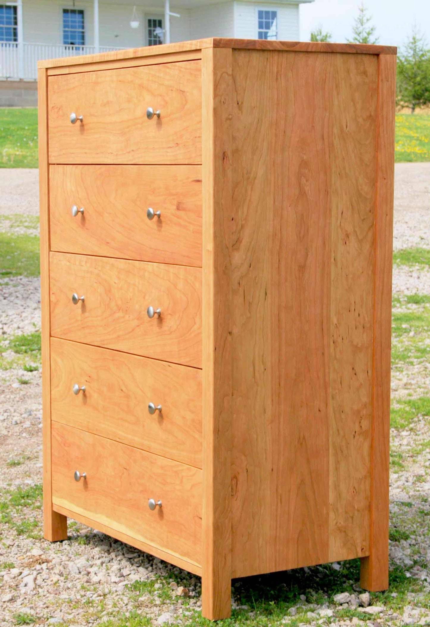 angled view walnut dresser with nickel pulls hardwood