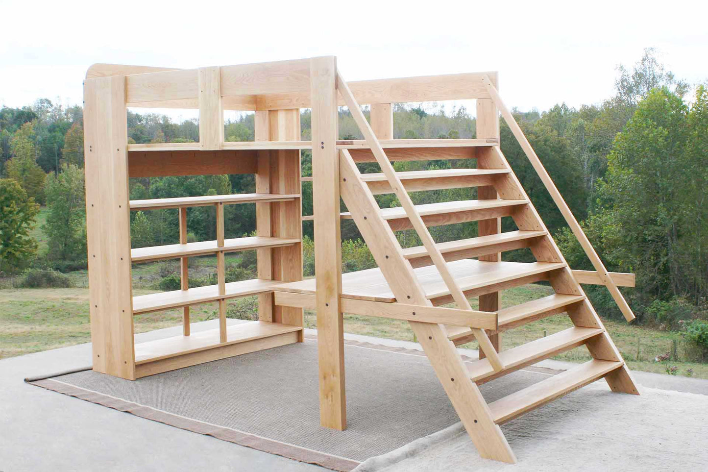 Loft bed with desk, stairs, and medium-depth shelves lbsnv01