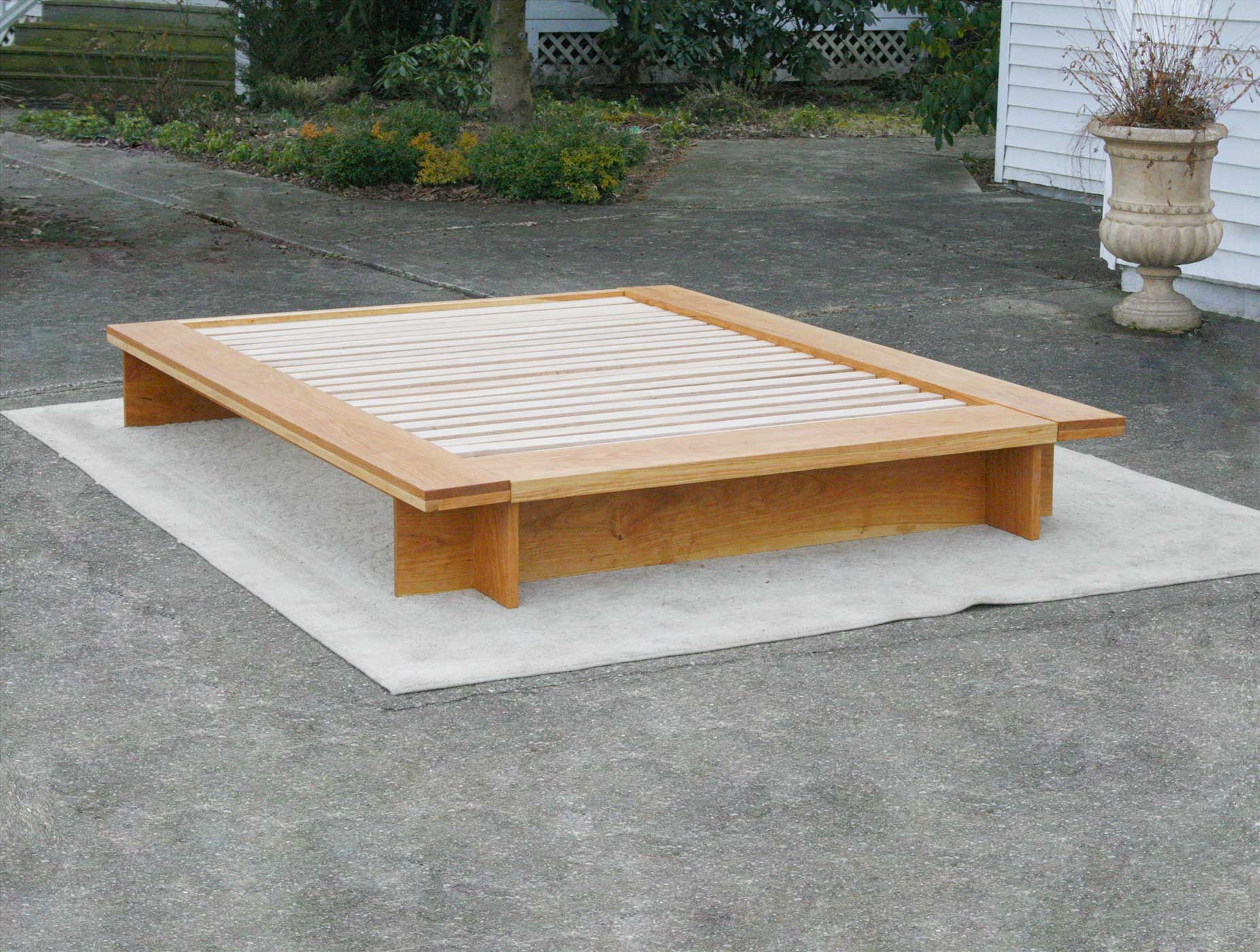 Low Platform Bed with wide platform and optional side tables front view