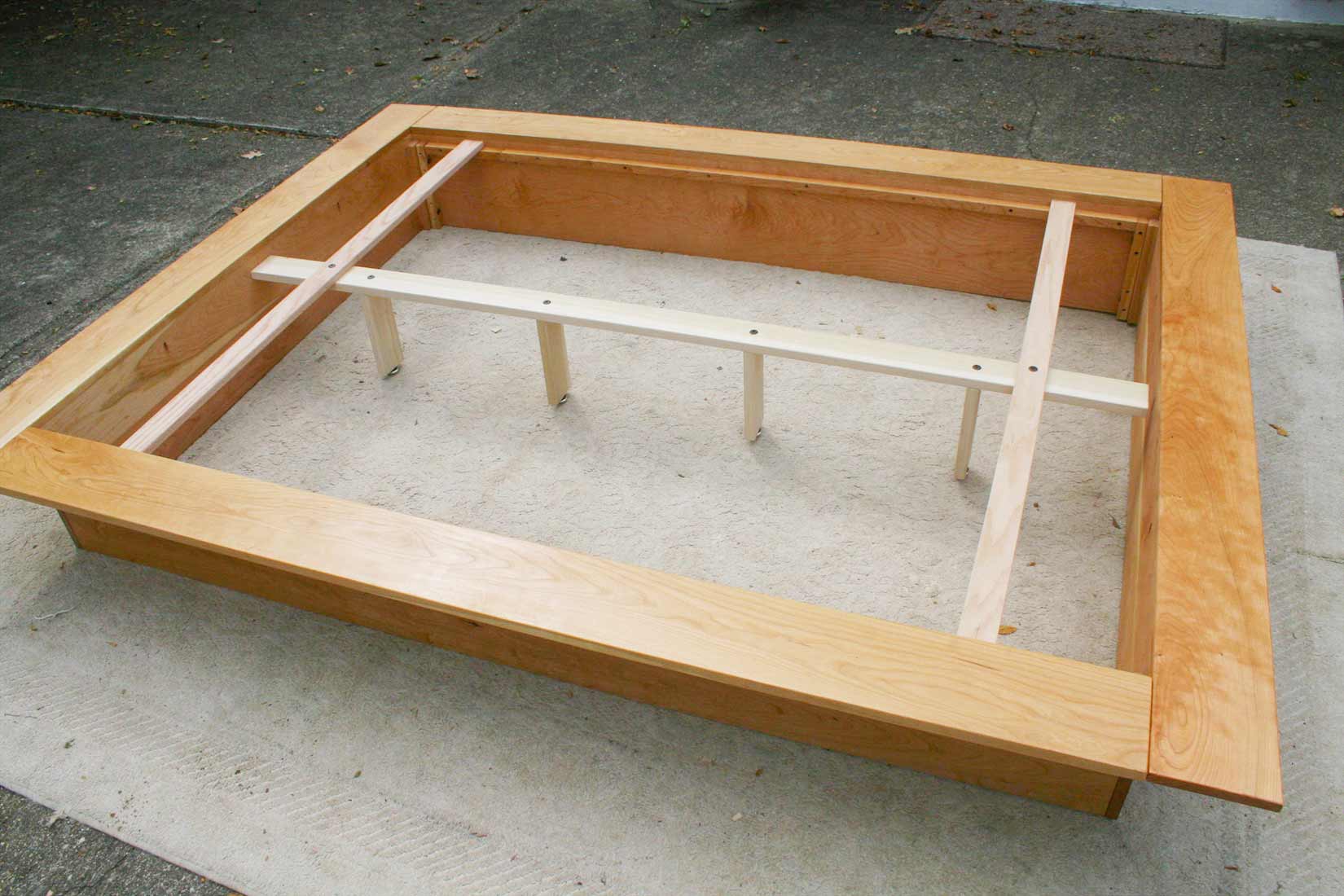 Low Platform Bed with no headboard and wide platform extensions no slats