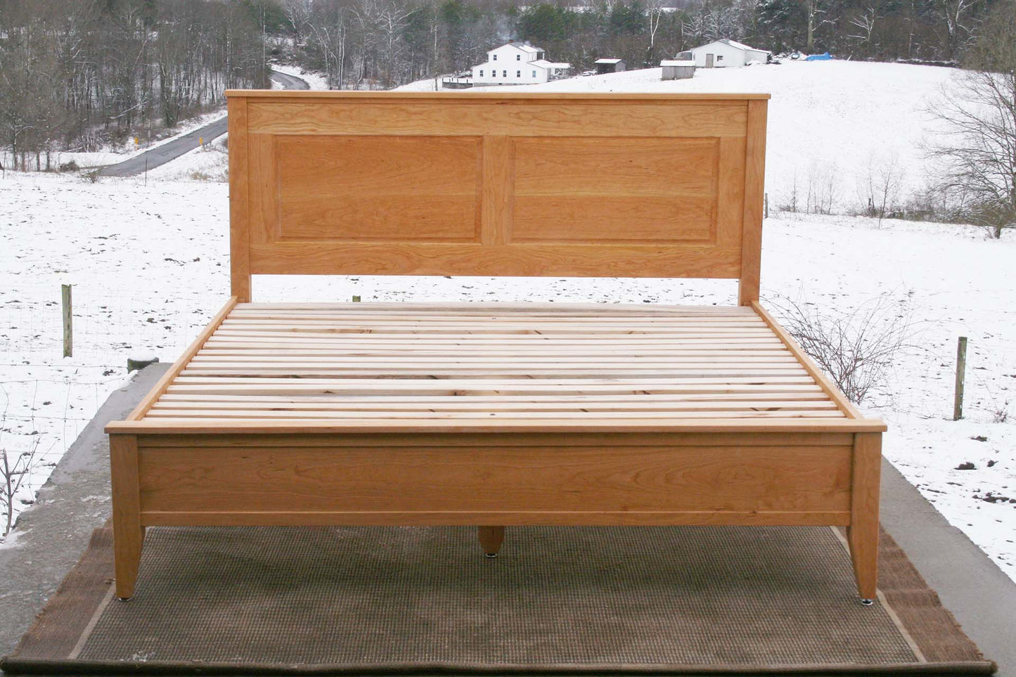 front view hardwood Platform Bed with paneled headboard and tapered post