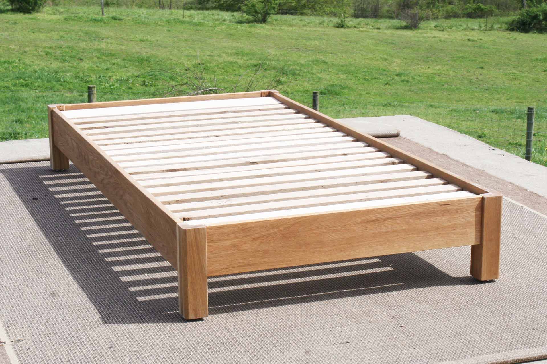 natural storage bed with 6 drawers and angled headboard