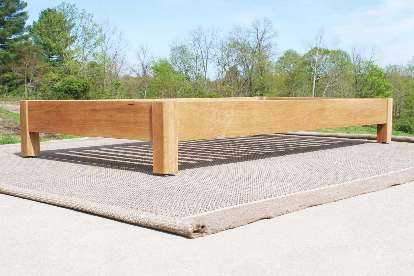 storage bed with 6 drawers and angled headboard low angled view