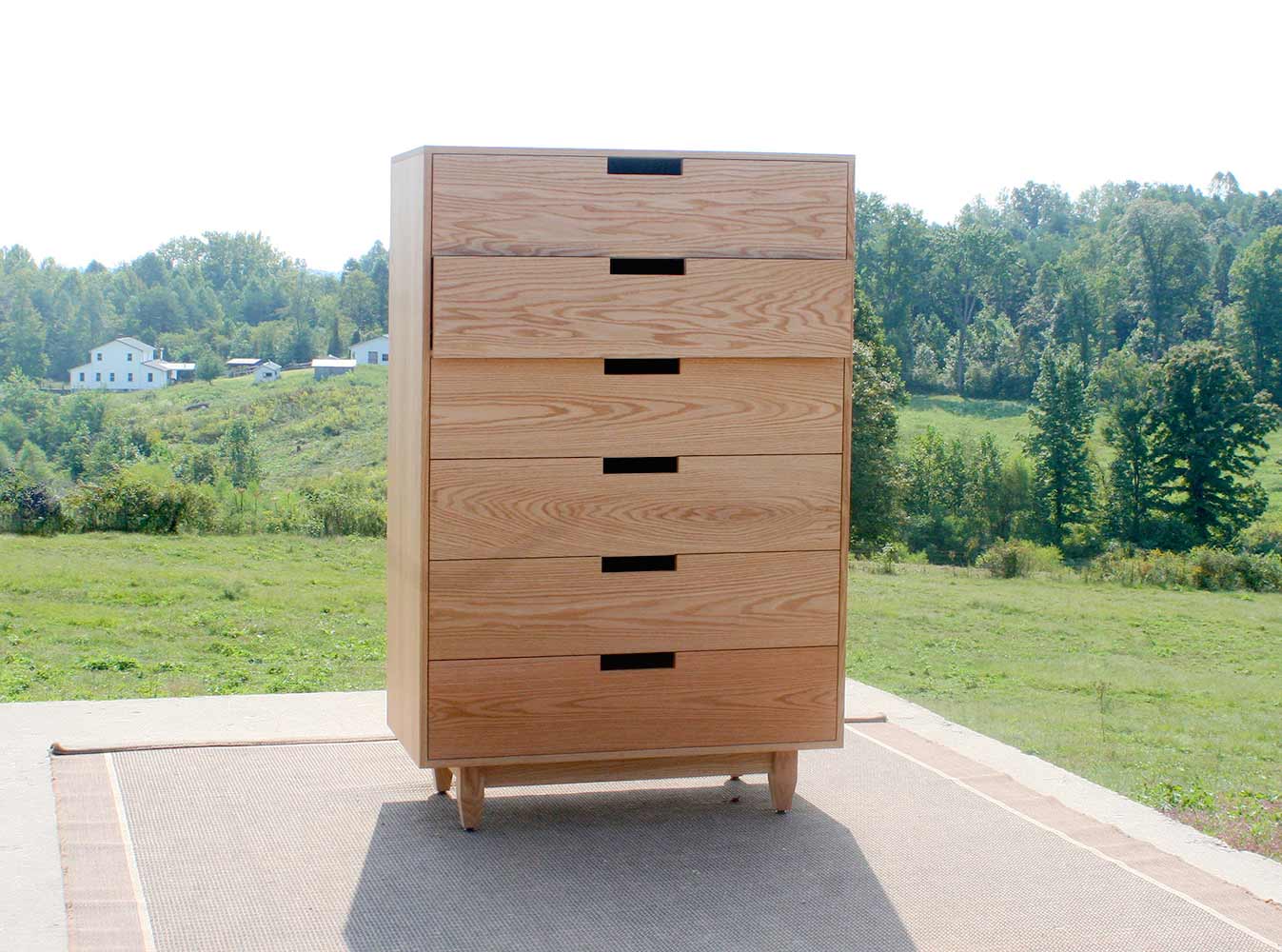 tall storage dresser with cut out drawers