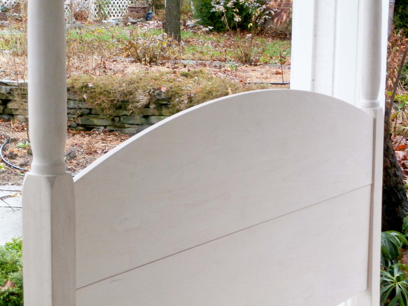 headboard of turned post bed with arched head and footboards
