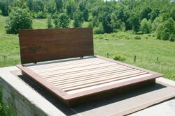 Platform Bed with large headboard and wide platform extensions front angled view