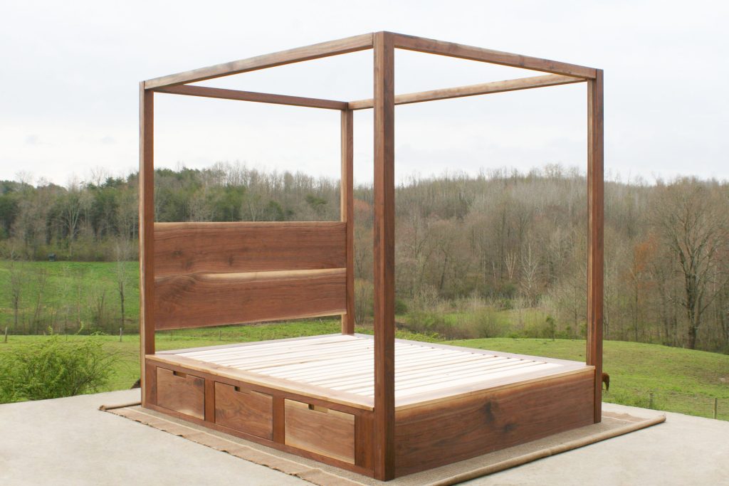 angled view natural Storage canopy bed with headboard and drawers